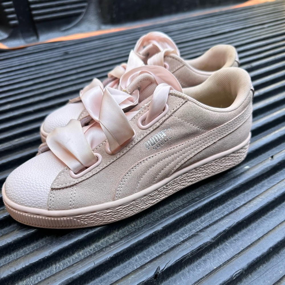 VIENNA, AUSTRIA  Puma Suede Heart Bubble rose sneaker on white background